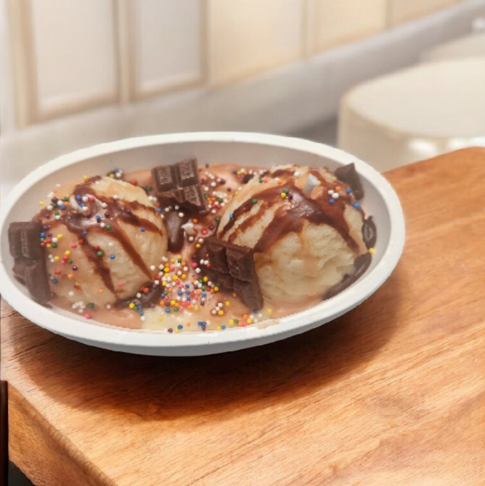 Candle Ice Cream Dessert with Chocolate and Sprinkles